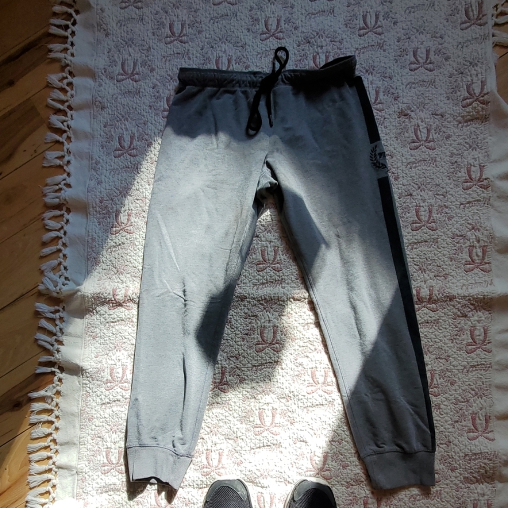 Pink  joggers the stripe is on one side.